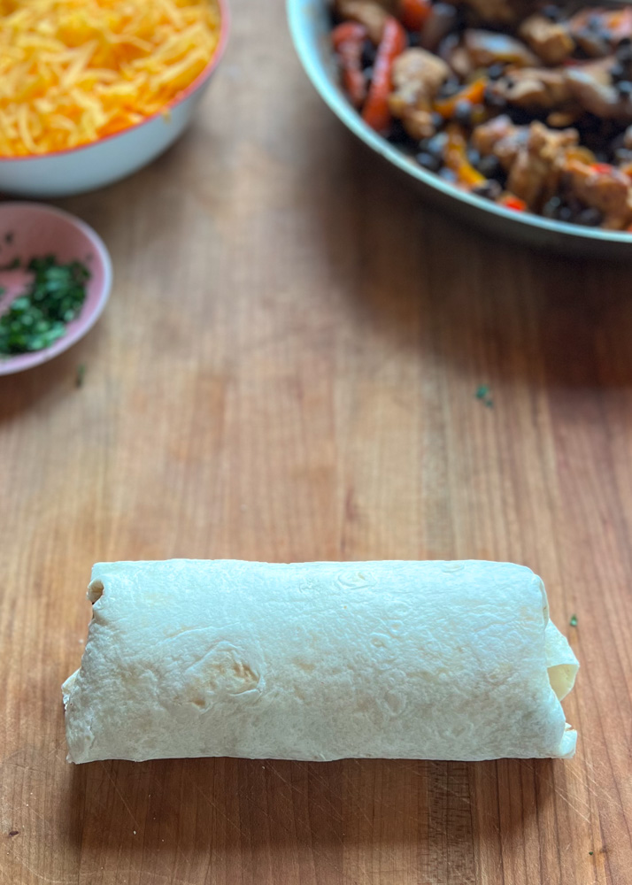 tortilla wrap on cutting board