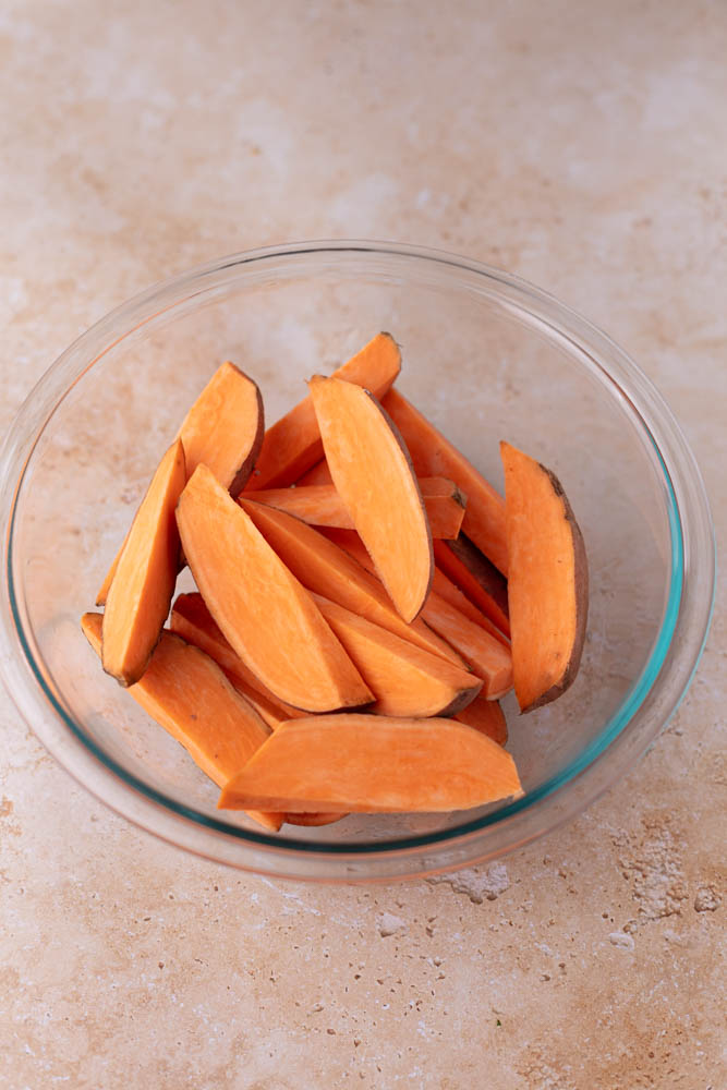sweet potato wedges in glass bowl