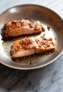 miso butter salmon filet on a plate