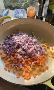 pan with diced carrots and red onion