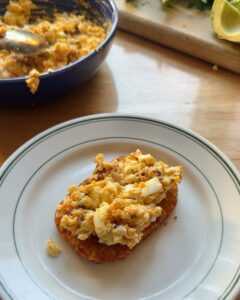 creamy homemade egg salad on crispy toast served on white plate for easy high protein breakfast or lunch recipe