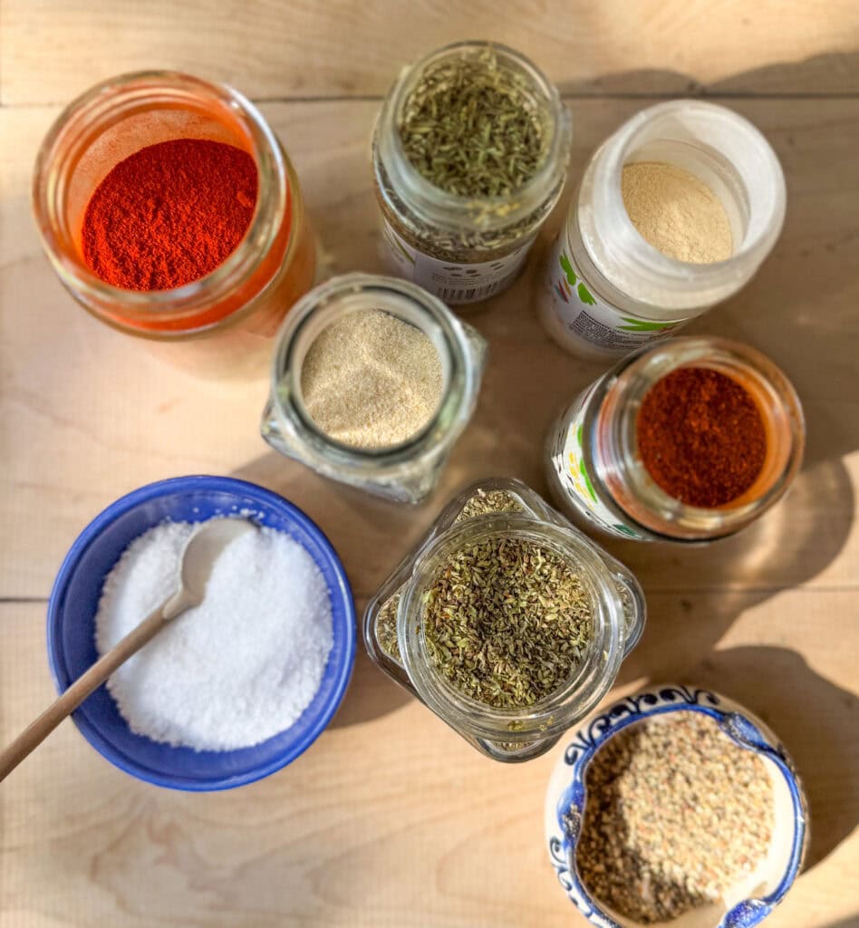 homemade blackened seasoning spices in jars paprika garlic powder oregano salt