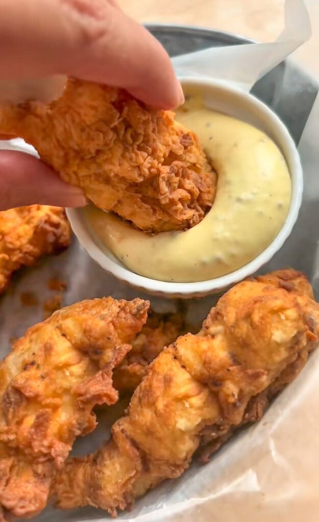hot honey mustard sauce served with crispy chicken tenders for dipping