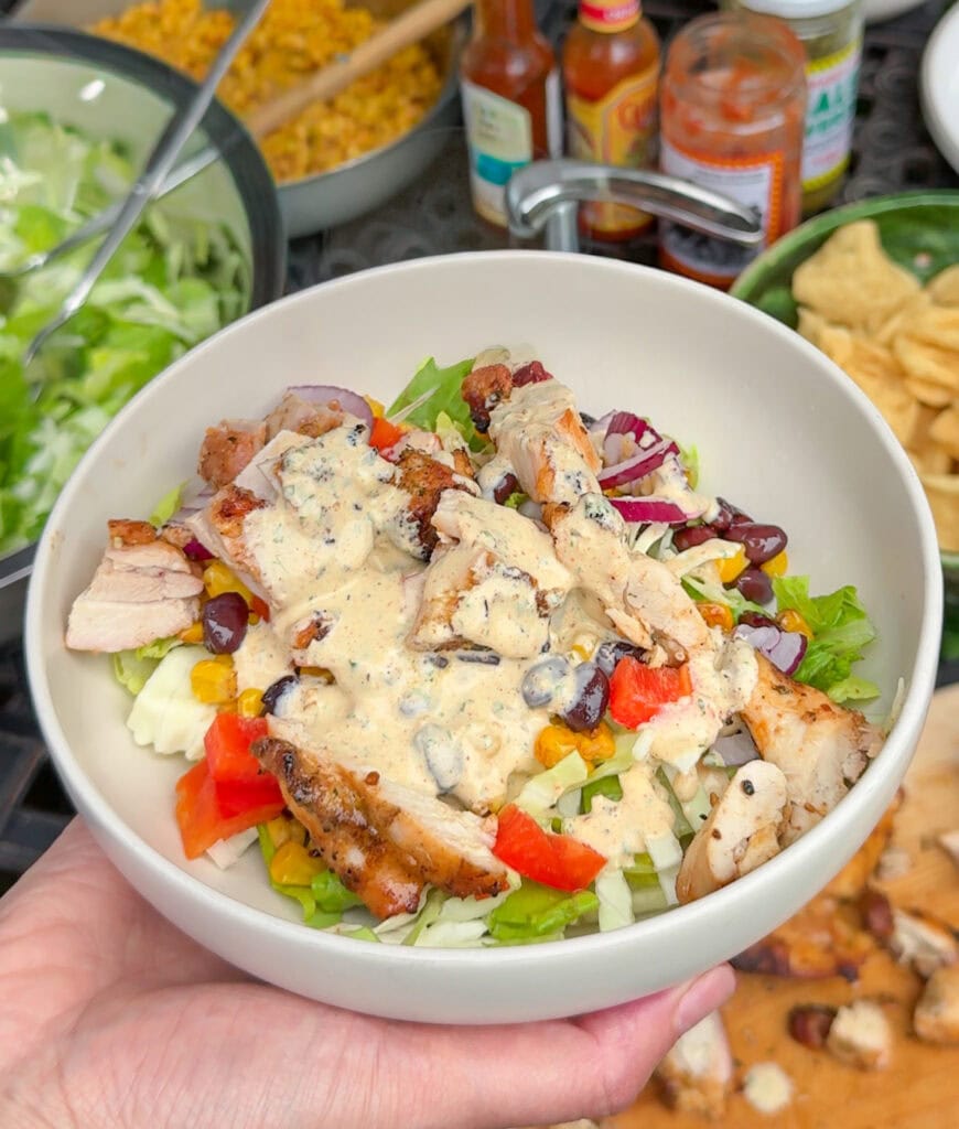southwest chicken salad with grilled chicken, beans, corn, and creamy taco salad dressing